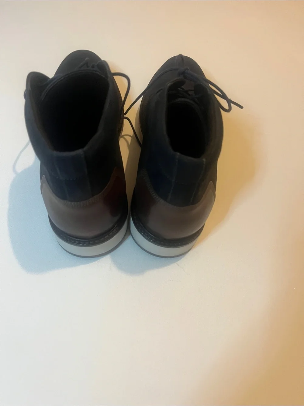 Men's  Johnston & Murphy Navy Chukka Boots with Brown Heel Accent, size 9M